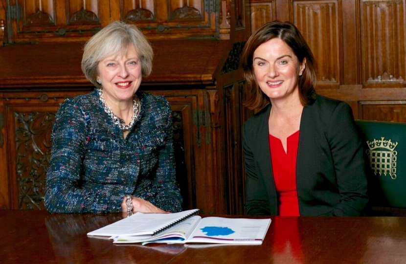 Lucy Allan and Theresa May 